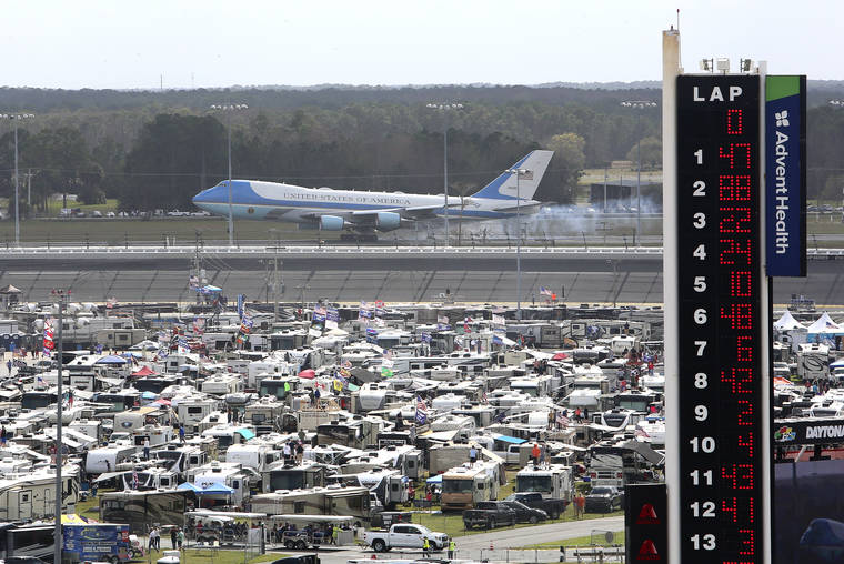 ASSOCIATED PRESS
                                Air Force One touches down at the Daytona Beach International’s Airport as seen from Daytona International Speedway as President Donald Trump makes his arrival to attend the NASCAR Daytona 500 auto race today in Daytona Beach, Fla.