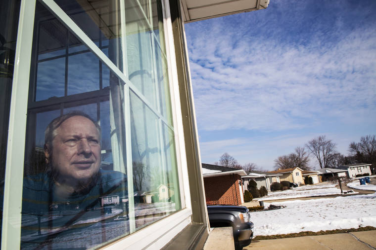 CHICAGO TRIBUNE VIA AP
                                Ken Zurek, 63, poses for a photo at his home in Highland, Ind. Zurek and his wife arrived in China days before news broke of the coronavirus.