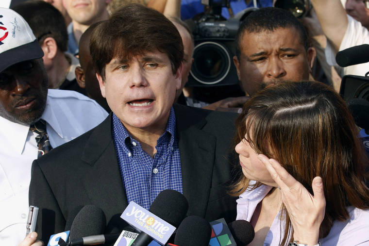 ASSOCIATED PRESS
                                Former Illinois Gov. Rod Blagojevich spoke to the media, in March 2012, outside his home in Chicago as his wife, Patti, wiped away tears a day before reporting to prison after his conviction on corruption charges. President Donald Trump says he has commuted the 14-year prison sentence of former Illinois Gov. Rod Blagojevich, Trump today told reporters the former governor’s sentence was “ridiculous.”