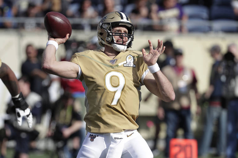 ASSOCIATED PRESS
                                NFC quarterback Drew Brees, of the New Orleans Saints, (9) looks to pass during the first half of the NFL Pro Bowl football game on Jan. 26 in Orlando, Fla.