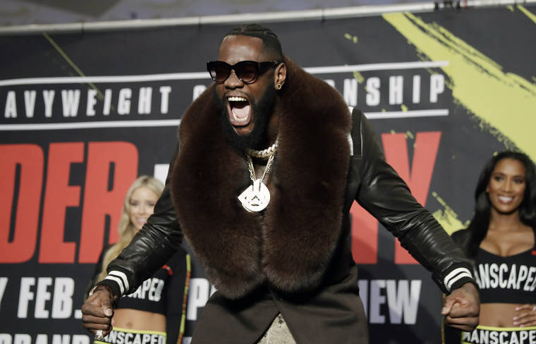 ASSOCIATED PRESS
                                Deontay Wilder arrives at the MGM Grand ahead of his WBC heavyweight championship boxing match against Tyson Fury, of England on Tuesday in Las Vegas.