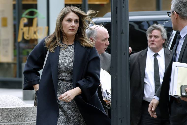 ASSOCIATED PRESS
                                Michelle Janavs arrives at federal court today in Boston for sentencing in a nationwide college admissions bribery scandal.