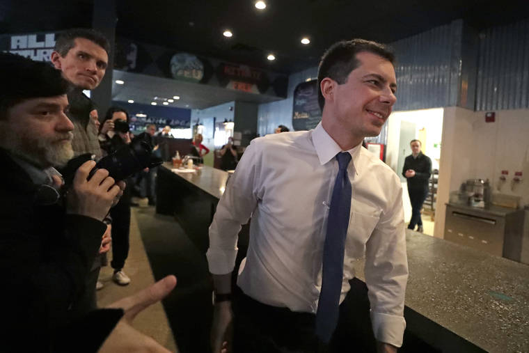 ASSOCIATED PRESS
                                Democratic presidential candidate former South Bend Mayor Pete Buttigieg arrives at Community Oven Pizza for a campaign event today in Hampton, N.H.