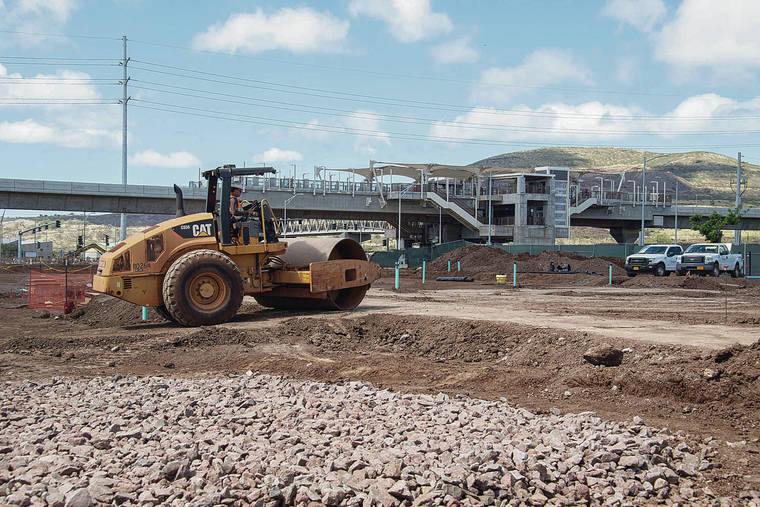 CRAIG T. KOJIMA / CKOJIMA@STARADVERTISER.COM
                                Heavy equipment started work Tuesday on The Element rental apartment project after a groundbreaking ceremony. The Kualaka‘i rail station is seen under construction in the background.