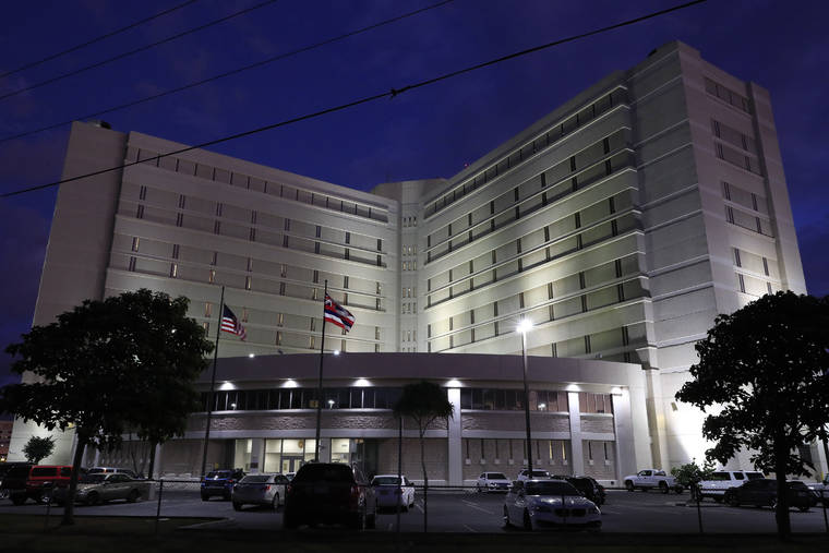 STAR-ADVERTISER
                                The Federal Detention Center, as seen in January 2019. Two asylum seekers from China were taken into custody at the airport by the U.S. Immigration and Customs Enforcement while trying to enter Hawaii.