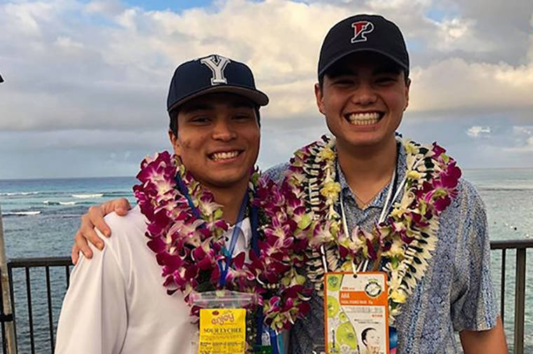 PAUL HONDA / PHONDA@STARADVERTISER.COM
                                Above, Punahou receiver Koa Eldredge, left, only got to catch passes from quarterback Hugh Brady, right, in two games last season because of Brady’s injury, but it didn’t keep either from realizing their dreams on Wednesday.