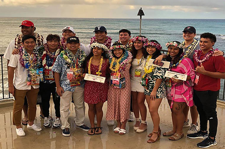 PAUL HONDA / PHONDA@STARADVERTISER.COM
                                Athletes, top, posed outside the Elks Lodge in Waikiki after Wednesday’s Education 1st ceremony, celebrating National Letter of Intent day. Above left, ‘Iolani signees Joshua Fournier (Grinnell College, baseball), Logan Luke (Rhodes College, baseball), Mary Shin (USC, Soccer) and Marea Lee (Swarthmore, Soccer) posed after the ceremony.