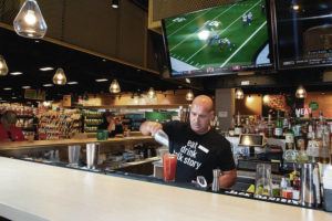 KAT WADE / SPECIAL TO THE STAR-ADVERTISER
                                Bartender Jay Sylva puts together a Bumper to Bumper Bloody Maria with chipotle tequila and an in-house “local-kine” bloody mary mix at the Pau Hana Bar inside Foodland Farms in Pearl City on Feb. 18.