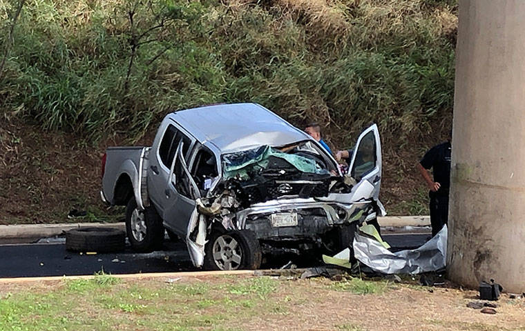 CINDY ELLEN RUSSELL / CRUSSELL@STARDVERTISER.COM
                                A male in his 60s was killed this morning when the vehicle he was driving struck a concrete rail transit pillar near Kahi Mohala.