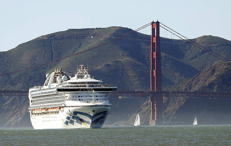 SCOTT STRAZZANTE/SAN FRANCISCO CHRONICLE VIA ASSOCIATED PRESS
                                The Grand Princess cruise ship passed the Golden Gate Bridge, Feb. 11, as it arrived from Hawaii in San Francisco. Scrambling to keep the coronavirus at bay, officials ordered the cruise ship to hold off the California coast, today, to await testing of those aboard, after a passenger on an earlier voyage died and at least one other became infected.