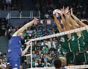 CINDY ELLEN RUSSELL / CRUSSELL@STARADVERTISER.COM
                                Hawaii’s Rado Parapunov (19), Max Rosenfeld (13) and Chaz Galloway (1) made a block against BYU outside hitter Zach Eschenberg (11) during the third set at Friday’s match.