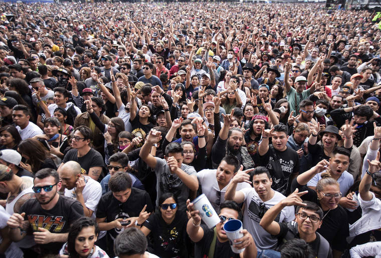 ASSOCIATED PRESS
                                Thousands cheer the Vive Latino festival in Mexico City on Saturday.
