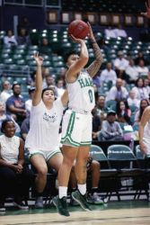 ANDREW LEE / SPECIAL TO THE STAR-ADVERTISER
                                With Barbara Rangel signalling an anticipated 3-point make, Hawaii’s Julissa Tago launched a 3 during the fourth quarter against Cal Poly on Saturday. Tago scored 19 points during the senior-night game.