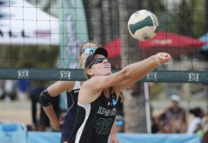 Cindy Ellen Russell / crussell@staradvertiser.com / 2019
                                Hawaii’s Morgan Martin bumped the ball during the match against Pepperdine at the Outrigger Duke Kahanamoku Beach Classic held in Waikiki last season.