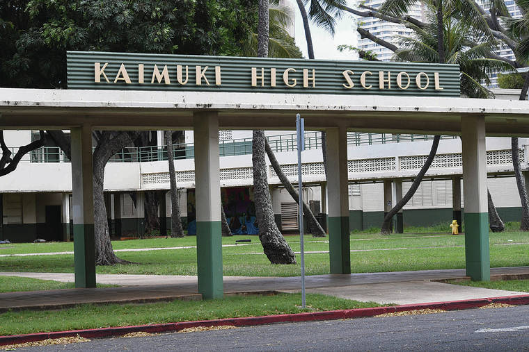 BRUCE ASATO / MARCH 23
                                Hawaii high schools, shuttered by the coronavirus outbreak, are considering different options to handle graduation ceremonies, from video conferencing to handing out diplomas via drive-thru. The Kaimuki High School campus remains quiet due to the stay-at-home order.