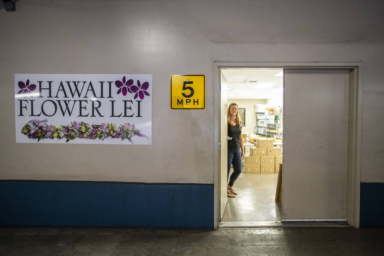 CINDY ELLEN RUSSELL / CRUSSELL@STARADVERTISER.COM
                                Hawaii Flower Lei owner Emily Steele is still running a bare-bones operation by herself and hopes to get a federal payroll protection loan to pay employees and expenses to keep her company alive.