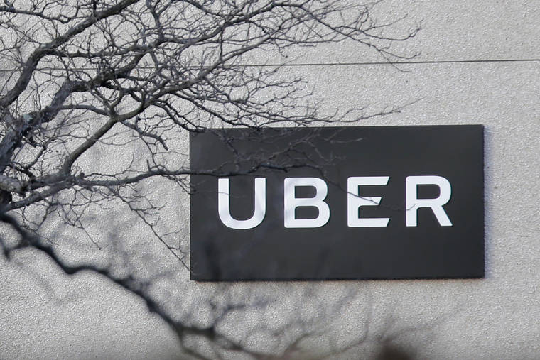 ASSOCIATED PRESS
                                An Uber office is seen in Secaucus, N.J. Uber drivers and other self-employed workers who have lost income because of the coronavirus pandemic will have to wait weeks before they can apply for financial assistance under the federal relief law.