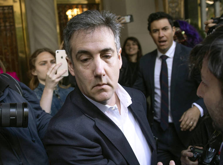 ASSOCIATED PRESS
                                In this May 6, 2019, file photo, Michael Cohen, former attorney to President Donald Trump, leaves his apartment building before beginning his prison term in New York.