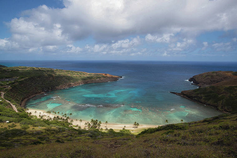 CINDY ELLEN RUSSELL / CRUSSELL@STARADVERTISER.COM
                                Hanauma Bay looked pristine and peaceful Tuesday.