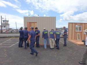 COURTESY PHOTO
                                The volunteers, with guidance from HPM Building Supply, constructed 32 8-feet by 10-feet shelters for the Hale Hanakahi Emergency Shelter facility.