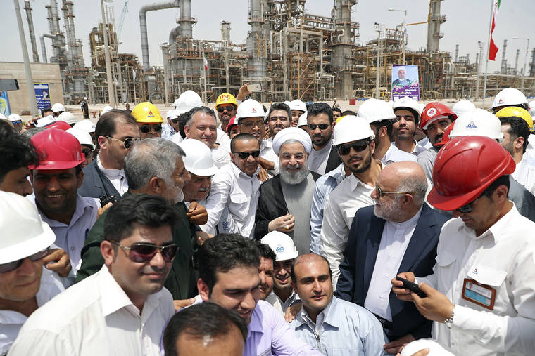 COURTESY OFFICE OF IRANIAN PRESIDENCY
                                Iranian President Hassan Rouhani, center, inaugurates the Persian Gulf Star Refinery in Bandar Abbas, Iran. Five Iranian tankers likely carrying at least $45.5 million worth of gasoline and similar products are now sailing to Venezuela, part of a wider deal between the two U.S.-sanctioned nations amid heightened tensions between Tehran and Washington. Analysts say the gasoline they carry came from the Persian Gulf Star Refinery.
