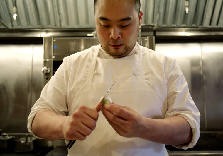 ASSOCIATED PRESS / APRIL 2008
                                Chef David Chang prepared vegetables for dinner at Momofuku Ko in New York City. A report says Asian Americans more than any other group are using digital devices and streaming services to watch TV.