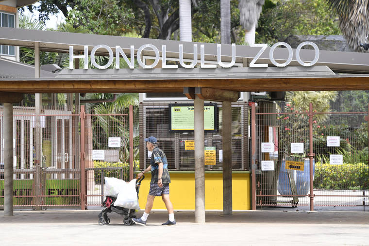 STAR-ADVERTISER / APRIL 3
                                Gates were closed at the Honolulu Zoo. The threat of the coronavirus and the unprecedented travel and social restrictions have negatively impacted businesses in the Waikiki area.