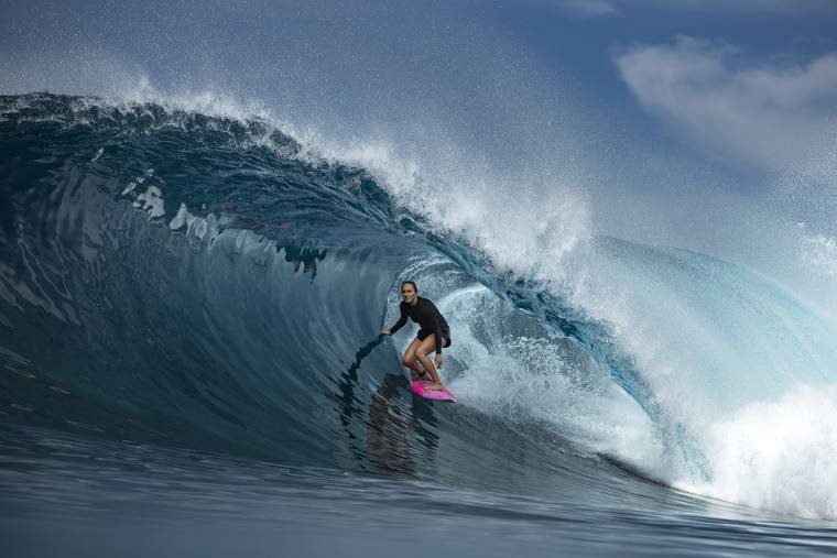 COURTESY BEN THOUARD/RED BULL CONTENT POOL
                                Carissa Moore surfing in Tahiti, 2019.