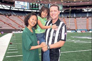 COURTESY MATT SUMSTINE
                                Matt Sumstine and his family at Aloha Stadium in 2012.
