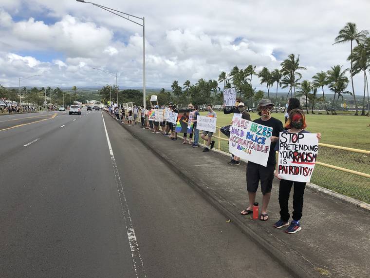 KEVIN DAYTON / KDAYTON@STARADVERTISER.COM
                                Hawaii island protesters gathered in Hilo today for a Black Lives Matter rally.