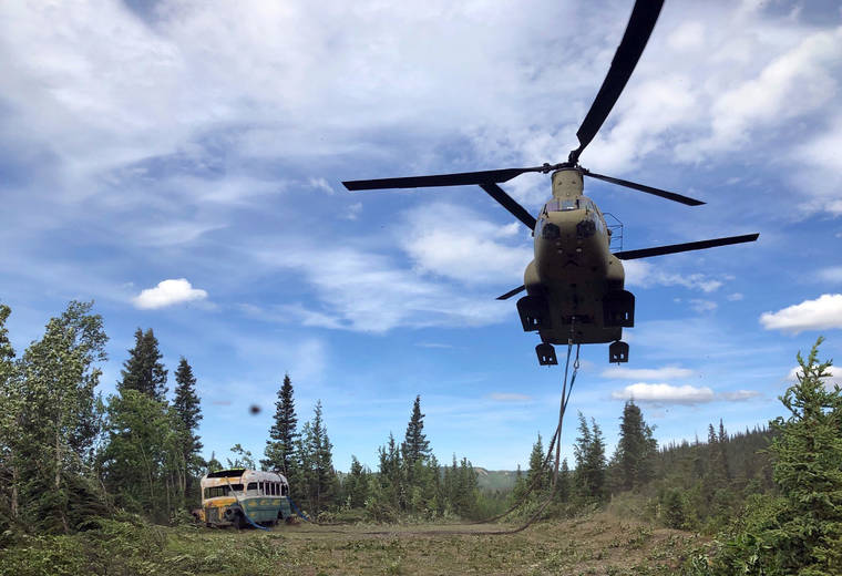 ASSOCIATED PRESS
                                In this photo released by the Alaska National Guard, Alaska Army National Guard soldiers use a CH-47 Chinook helicopter to removed an abandoned bus, popularized by the book and movie “Into the Wild,” out of its location in the Alaska backcountry today as part of a training mission.