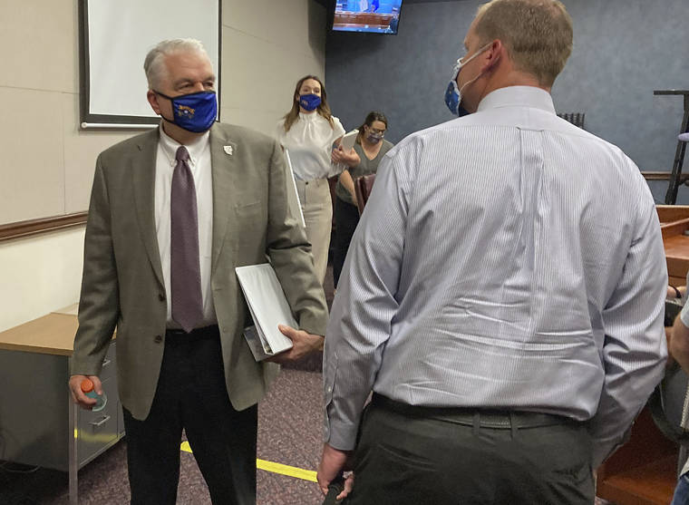 ASSOCIATED PRESS / JUNE 24
                                Nevada Gov. Steve Sisolak exits a news conference at the Nevada State Legislature in Carson City, Nev. Sisolak announced Nevada would join California, Washington and North Carolina in requiring individuals wear masks in public places to contain the spread of the coronavirus.