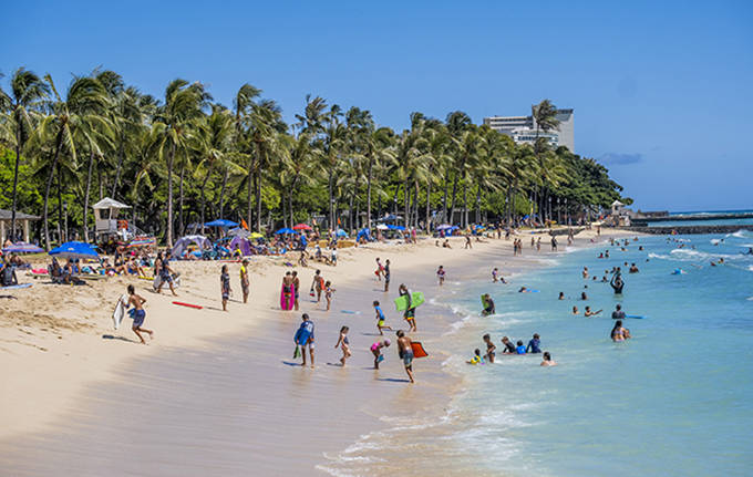 DENNIS ODA / MAY 17
                                Many Hawaii residents have been venturing outside, including to Waikiki Beach, as more coronavirus restrictions are lifted and the statewide infection remains relatively low compared to the rest of the nation.