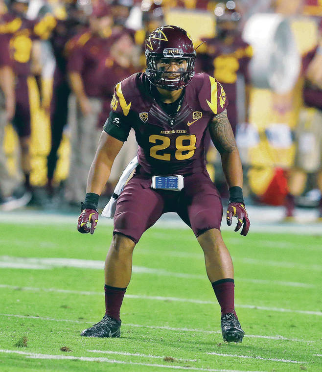 ASSOCIATED PRESS / 2014
                                Hawaii assistant coach Laiu Moeakiola was a two-time All-Pac 12 honorable mention selection at Arizona State and led the Sun Devils with nine passes broken up as a senior in 2016.