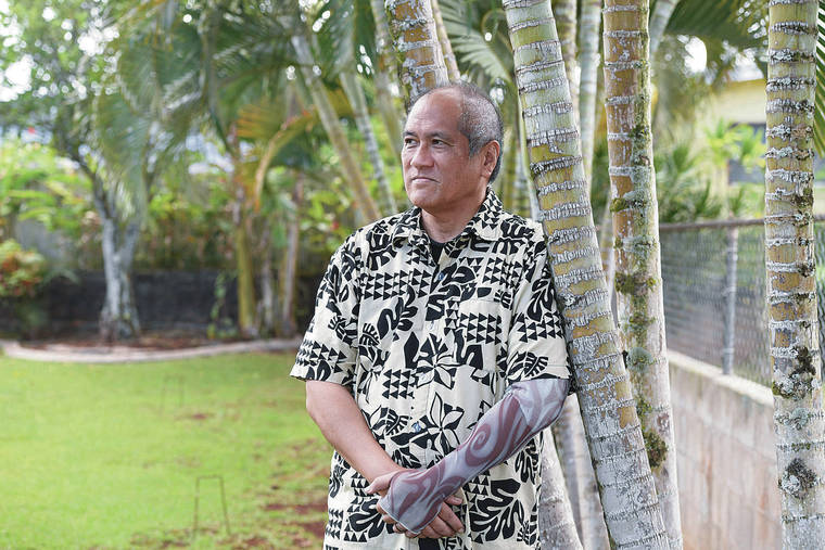 BRUCE ASATO / BASATO@STARADVERTISER.COM
                                Dr. Lucio Pascua fell ill with COVID-19 in March after a trip to New Jersey and New York for his daughter’s engagement party. He was on a ventilator for 10 days and developed sepsis — blood poisoning — before finally recovering. Pascua stands in his front yard.