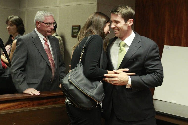 GEORGE F. LEE / 2014
                                U.S. Special Agent Christopher Deedy hugs his wife Stephanie Deedy in August 2014, following his acquittal in the Nov. 2011 shooting of Kollin Elderts in Waikiki. The U.S. Supreme Court has refused to hear a case over whether Deedy should face a third trial over the fatal shooting.