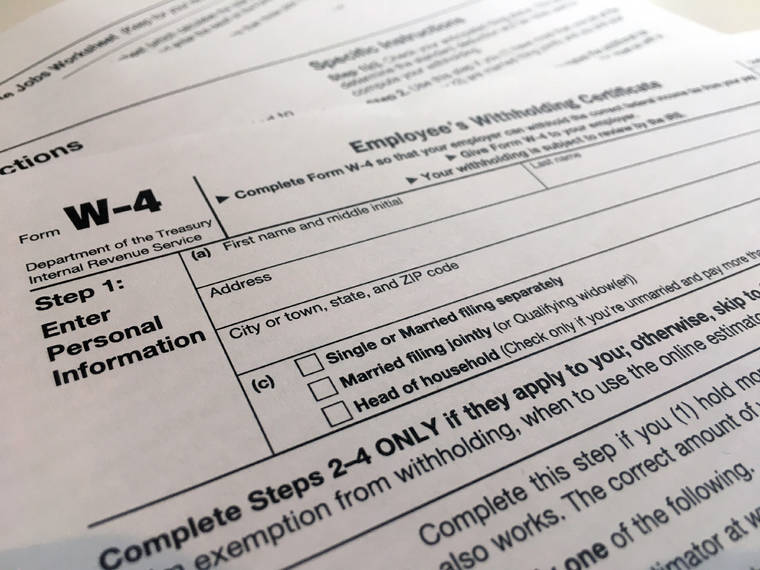 ASSOCIATED PRESS
                                A W-4 form was viewed, Feb. 5, in New York. As the coronavirus pandemic took hold this spring, the federal government postponed the traditional April 15 filing deadline until July 15.