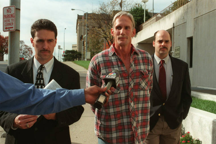 JIM BARCUS/THE KANSAS CITY STAR VIA ASSOCIATED PRESS
                                Wesley Ira Purkey, center, was escorted by police officers, in 1998, in Kansas City, Kan., after he was arrested in connection with the death of 80-year-old Mary Ruth Bales. Purkey was also convicted of kidnapping and killing a 16-year-old girl.
