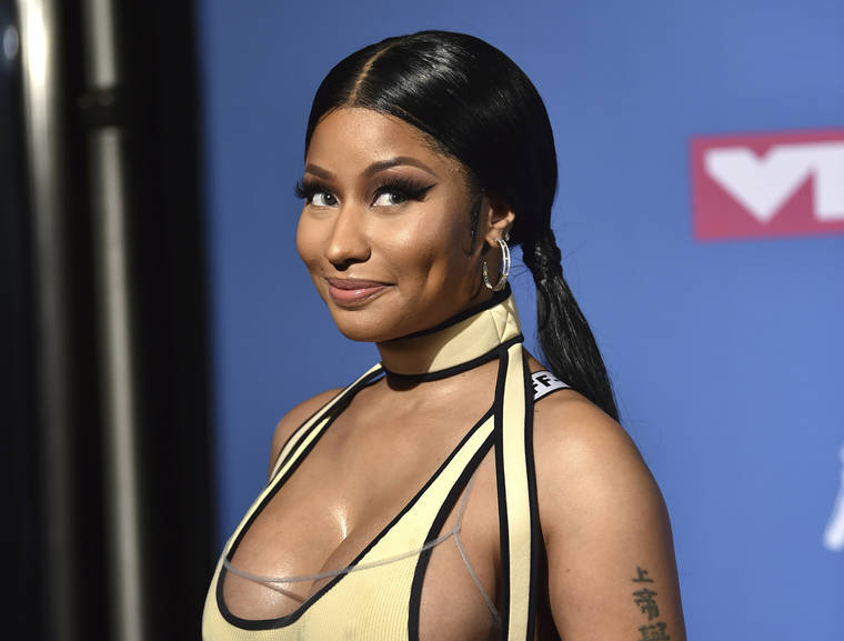 EVAN AGOSTINI/INVISION/ASSOCIATED PRESS
                                Nicki Minaj at the MTV Video Music Awards, in Aug. 2018, in New York. Minaj has a new release coming soon: her first child. The rapper took to Instagram on Monday to announce she is pregnant, posting photos of herself with a baby bump. One caption simply read: “#Preggers.”
