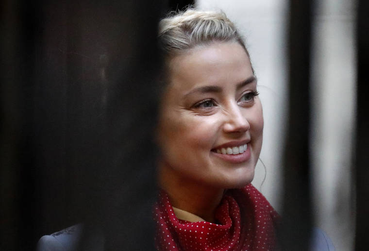 ASSOCIATED PRESS
                                Actress Amber Heard arrived at the High Court in London, today. Actor Johnny Depp is suing News Group Newspapers, publisher of The Sun, and the paper’s executive editor, Dan Wootton, over an April 2018 article that called him a “wife-beater.” Depp strongly denies all allegations.