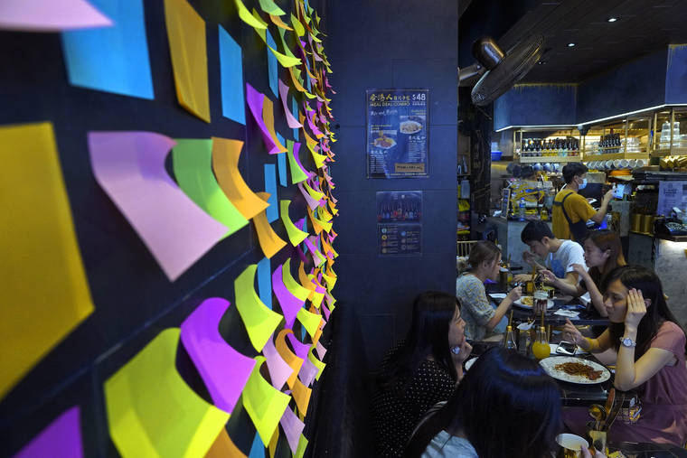 ASSOCIATED PRESS
                                A Hong Kong Cafe, known as a “yellow shop” because its owners expressed sympathy for protesters, has a wall decorated with blank post-it notes in Hong Kong. Stores that supported the protest movement by putting up protest artwork and sticky notes filled with words of encouragement from customers have since taken them down, out of fear that its contents could land them in trouble with the authorities. Instead, they have put up blank sticky notes as a way to show solidarity with the movement.