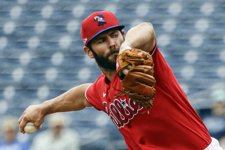 ASSOCIATED PRESS / FEBRUARY 25
                                Philadelphia Phillies starting pitcher Jake Arrieta throws during the second inning of a spring training baseball game against the Toronto Blue Jays in Clearwater, Fla.