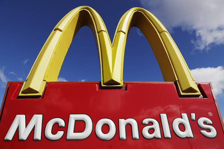 ASSOCIATED PRESS
                                A McDonald’s sign was displayed outside the fast-food restaurant in Wheeling, Ill., April 9. McDonald’s said it will be requiring customers to wear face coverings when entering its U.S. restaurants as the number of new virus cases continues to surge in many states.