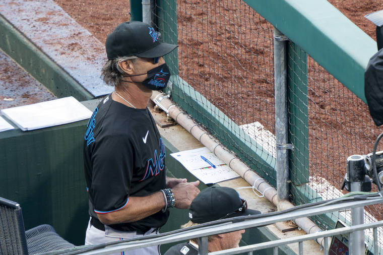 ASSOCIATED PRESS
                                Miami Marlins’ manager Don Mattingly looks out from the dugout during the eighth inning of a baseball game against the Philadelphia Phillies on Saturday.