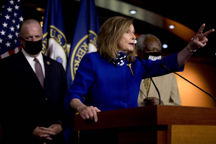 ASSOCIATED PRESS
                                House Speaker Nancy Pelosi of Calif., accompanied by Rep. Dan Kildee, D-Mich., left, and Rep. Danny Davis, D-Ill., right, spoke at a news conference on Capitol Hill in Washington, Friday, on the extension of federal unemployment benefits.