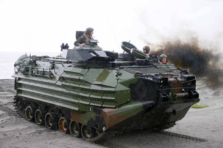ASSOCIATED PRESS
                                U.S. Marines from the 3rd Marine Expeditionary Brigade rode on their Amphibious Assault Vehicle (AAV) during the joint US-Philippines amphibious landing exercise, in Oct. 2016, at Naval Education Training Command in San Antonio northwest of Manila, Philippines. A training accident off the coast of Southern California in an AAV similar to this one has taken the life of one Marine, injured two others and left eight missing.