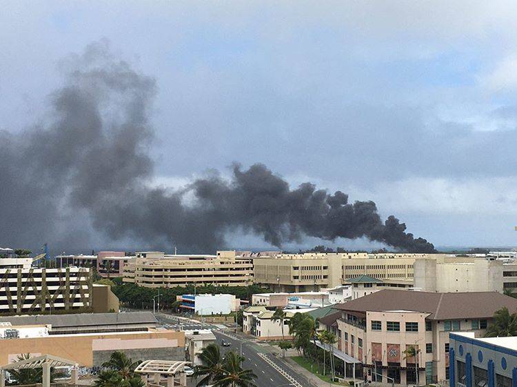 COURTESY @KEVINCKPHOTO ON INSTAGRAM
                                Honolulu firefighters this morning were battling a fire in an industrial area of Sand Island that generated smoke that could be seen for miles.