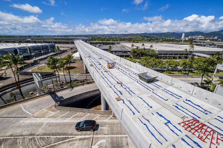 STAR-ADVERTISER
                                Construction on the HART mass transit rail line is seen at Daniel K. Inouye International Airport on April 27.