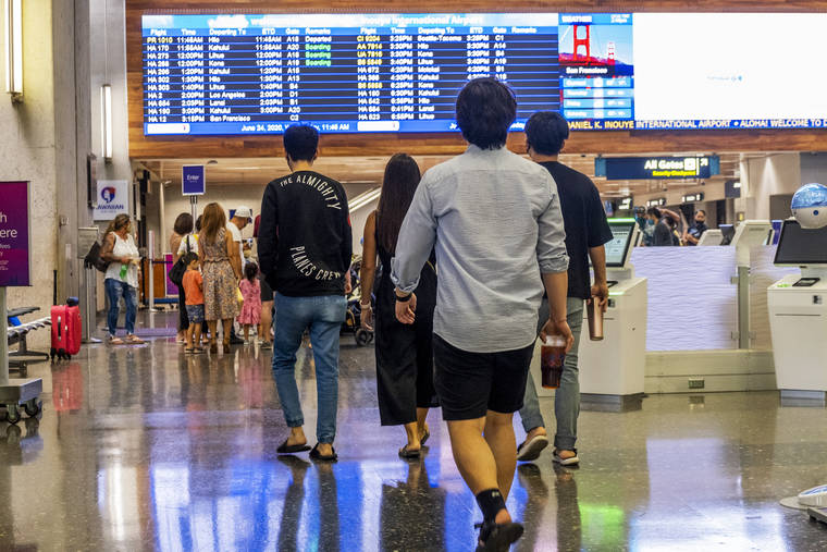 DENNIS ODA / STAR-ADVERTISER
                                Travelers arrived and left Oahu, May 24, at the Daniel K. Inouye International Airport at Terminal 1. The number of visitors who flew to Hawaii on Monday rose above 600 after several days below that marker, according to the Hawaii Tourism Authority.