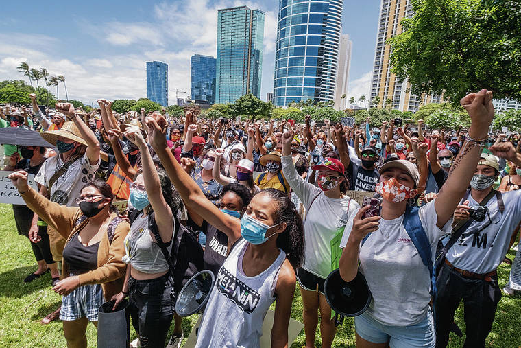 DENNIS ODA / JUNE 6
                                Rally participants gathered Ala Moana Regional Park before the start of the Black Lives Matter march.